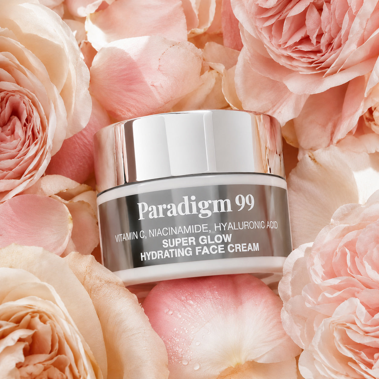 Paradigm 99 face cream jar surrounded by pink roses
